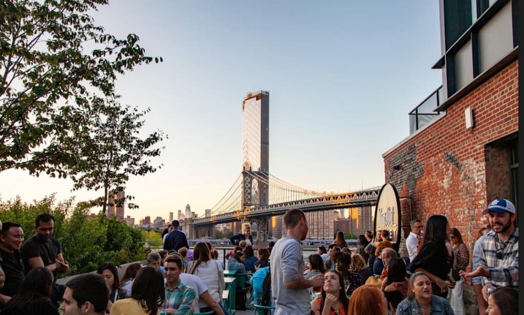 Time Out Market rooftop terrace with Manhattan Bridge views in DUMBO